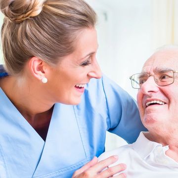 Professional caregiver supporting a client